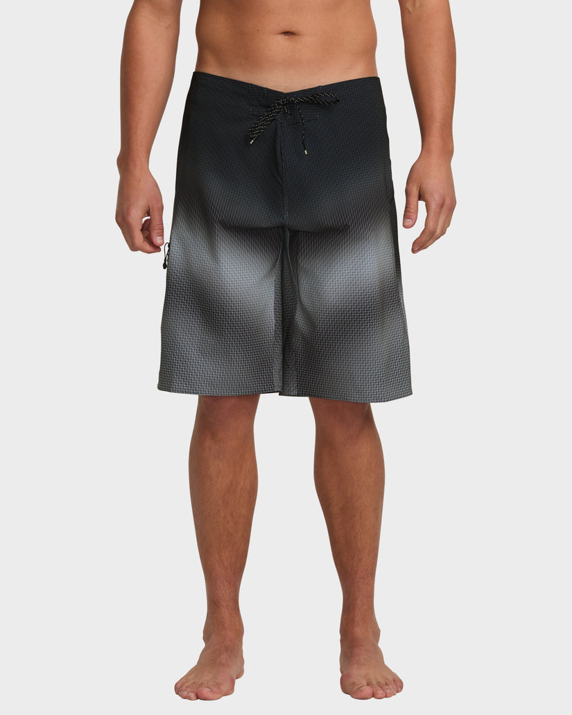 Black boardshorts with a drawcord waist and a subtle gradient pattern, viewed from the front.