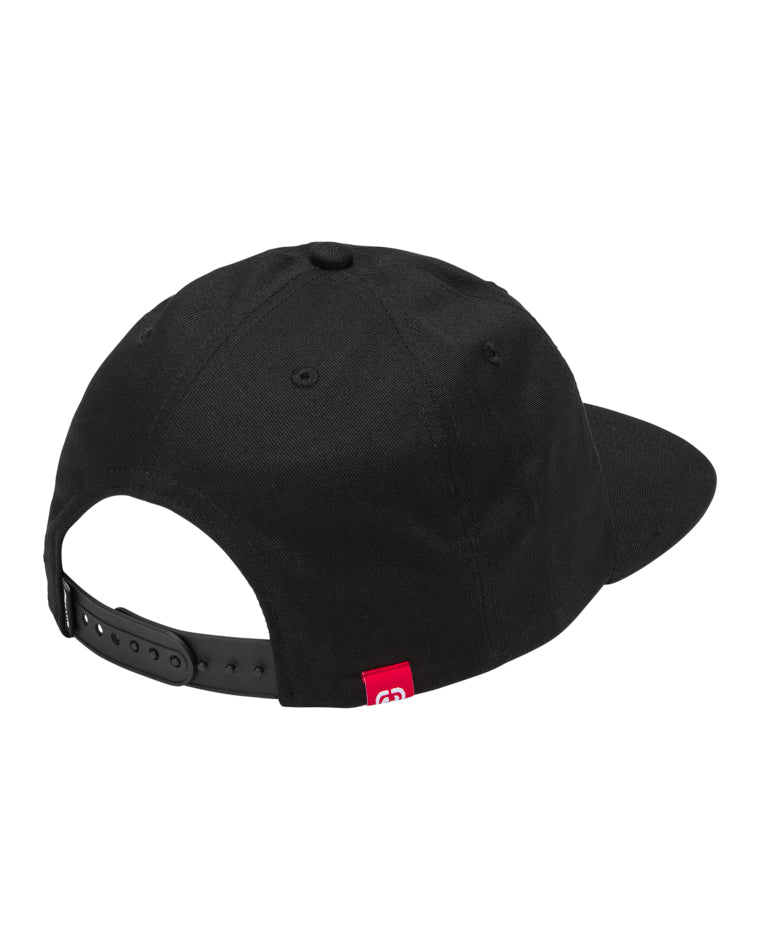 Black snapback cap shown from the back, featuring an adjustable strap and a small red logo tag on the lower edge.