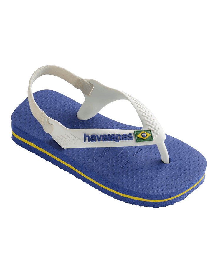 Side view of blue Havaianas baby thong with yellow stripe sole and white back strap