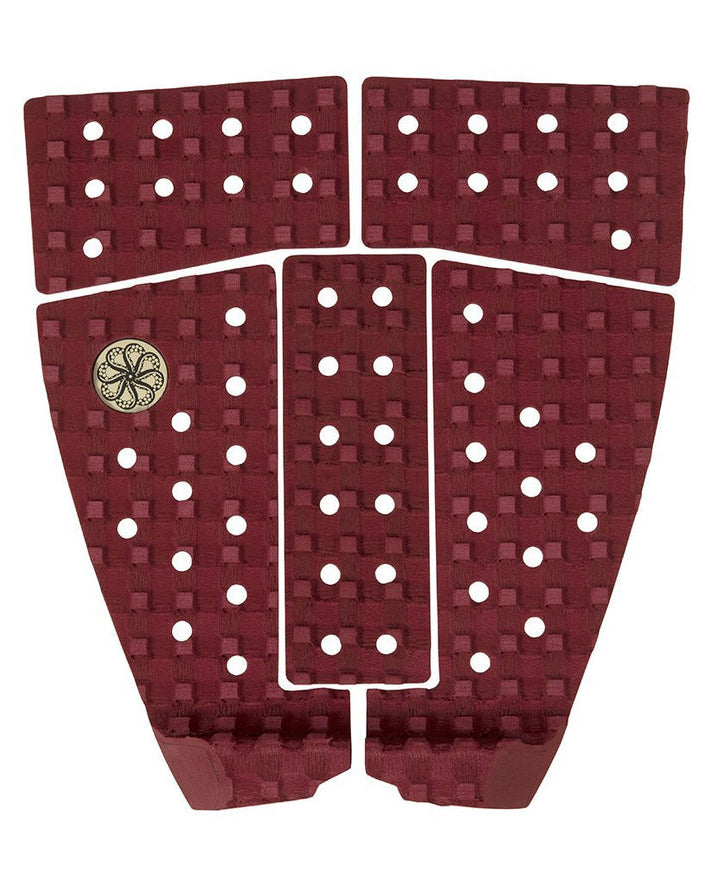 Maroon five-piece surfboard traction pad with perforated grip and arch support.