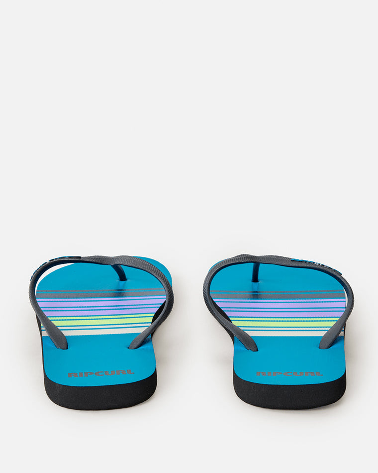 Blue Rip Curl thongs with striped design, viewed from the back
