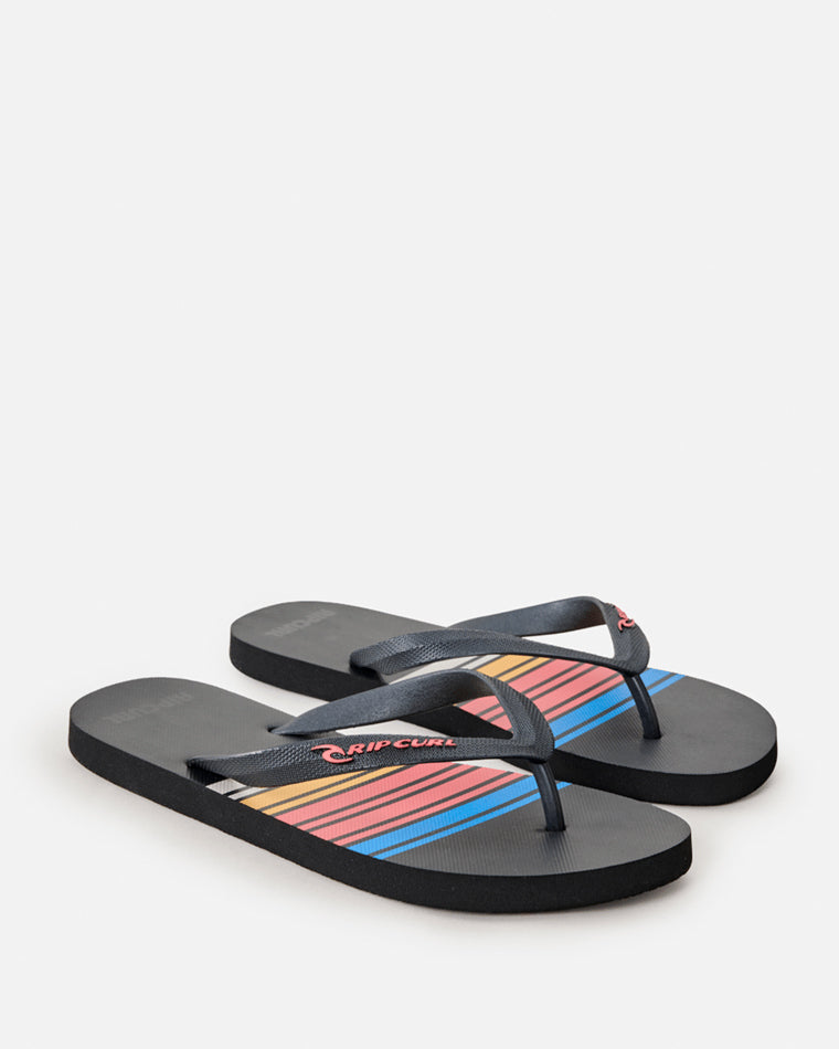 Black Rip Curl thongs with multicoloured stripe print and logo on straps