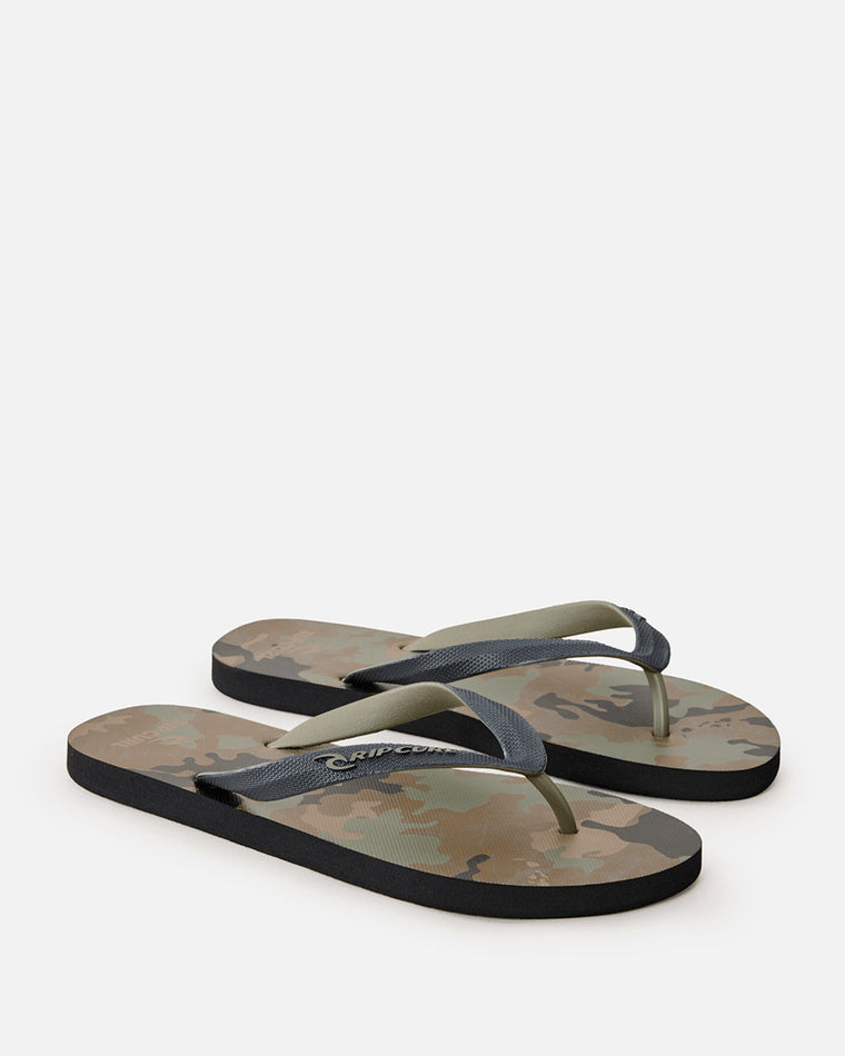 Camo print thongs with black and olive green straps and Rip Curl logo on footbed.