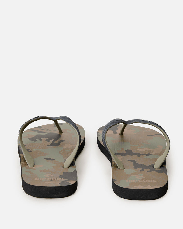 Rear view of camo print Rip Curl thongs with black soles and olive green straps.