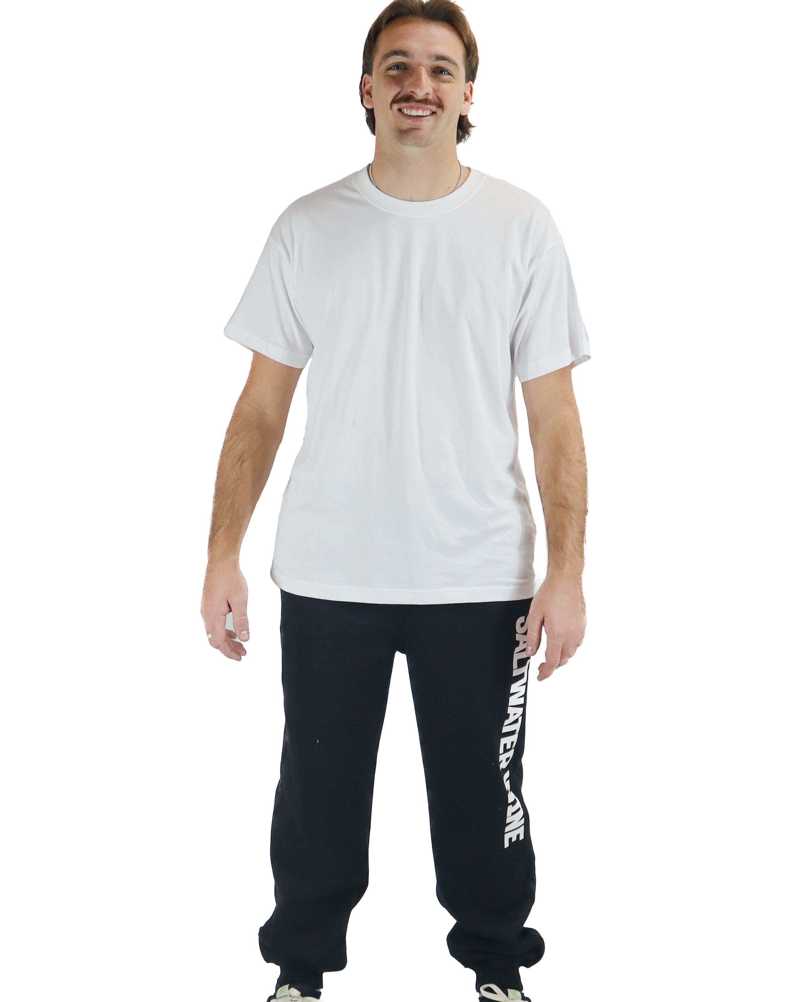 Black sweatpants with vertical leg print, worn with white tee and sneakers