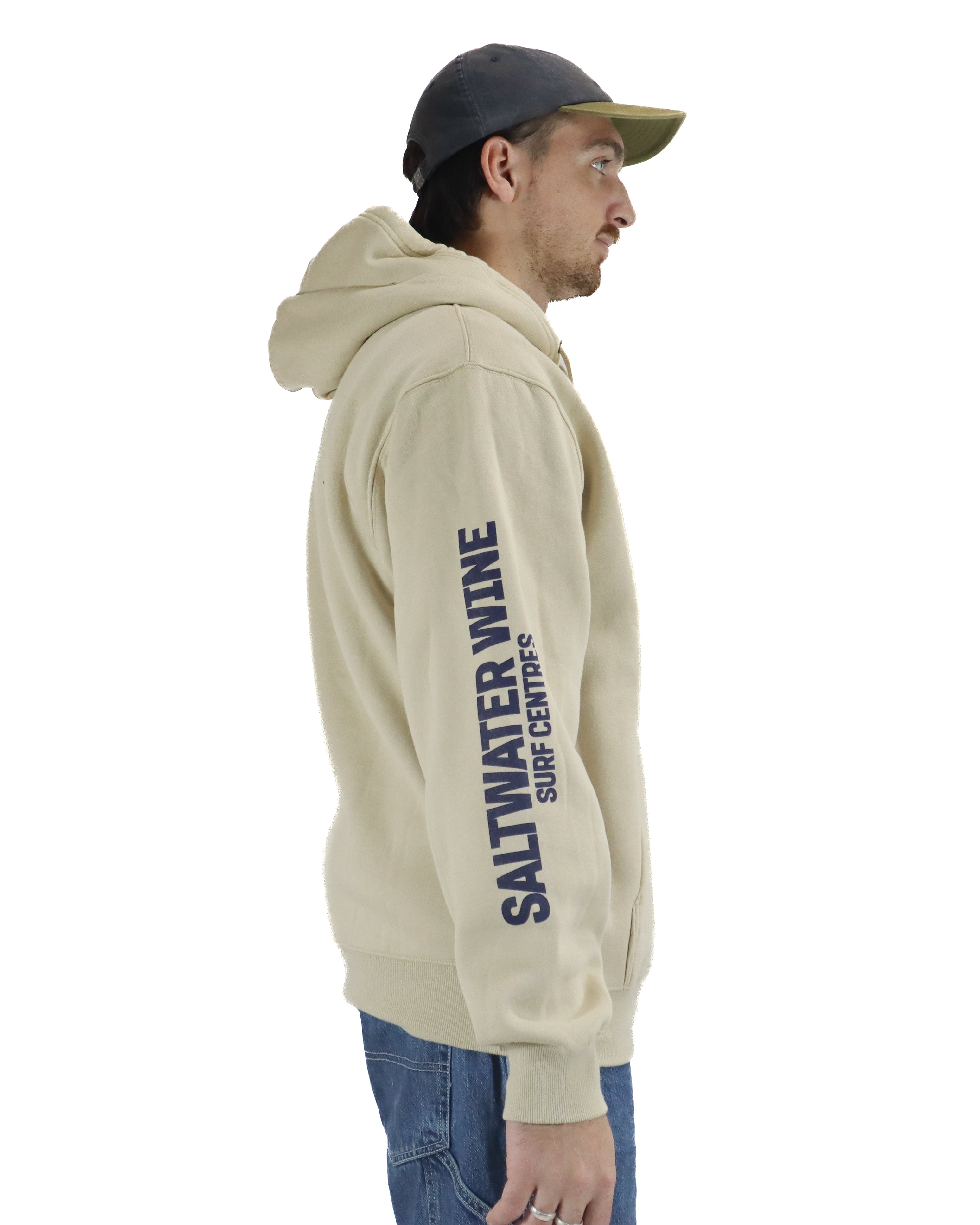 Side view of sand hoodie with Saltwater Wine Surf Centres print down the sleeve