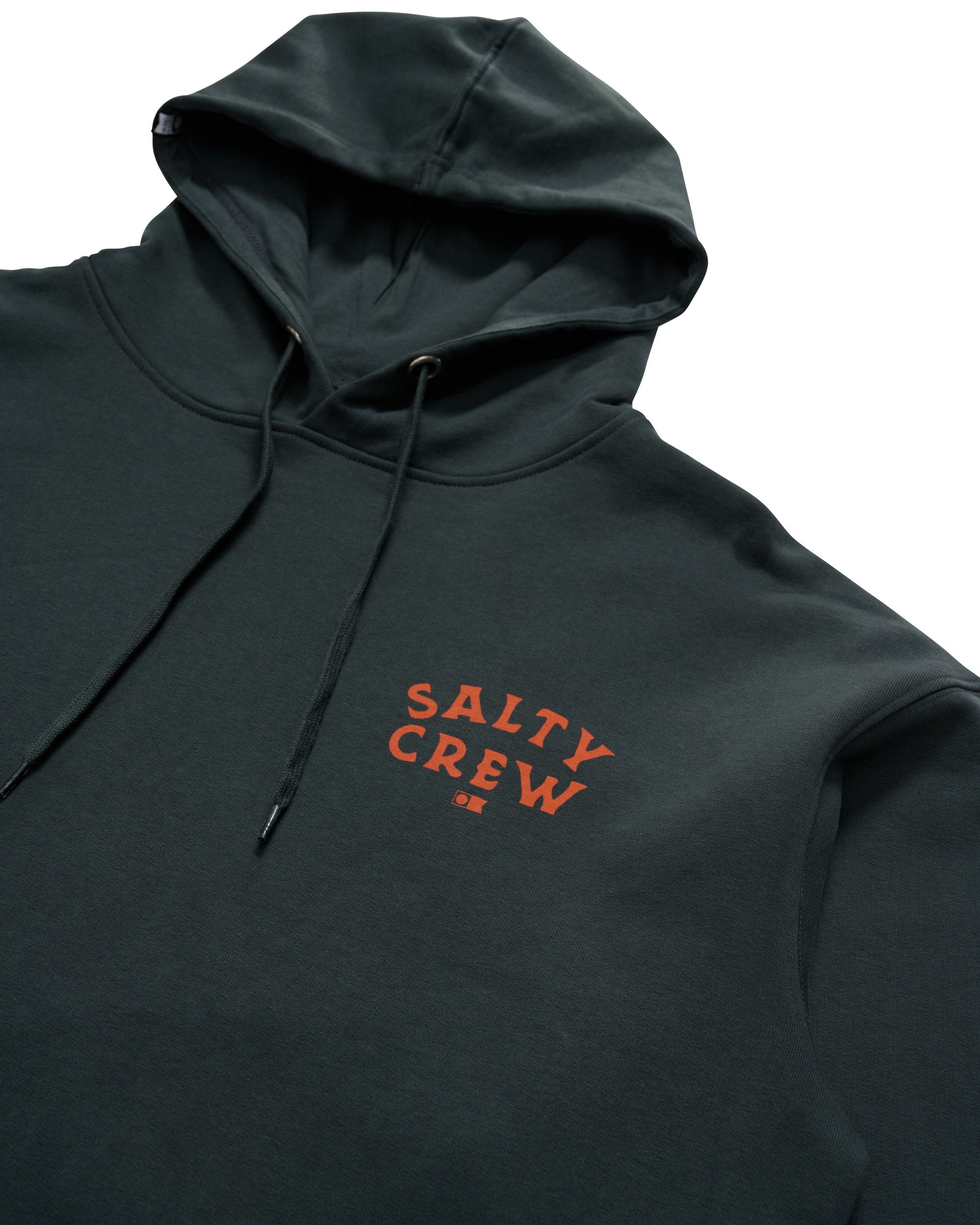 Close-up of a black Salty Crew hoodie with red logo text on the chest and drawstrings, laid flat.