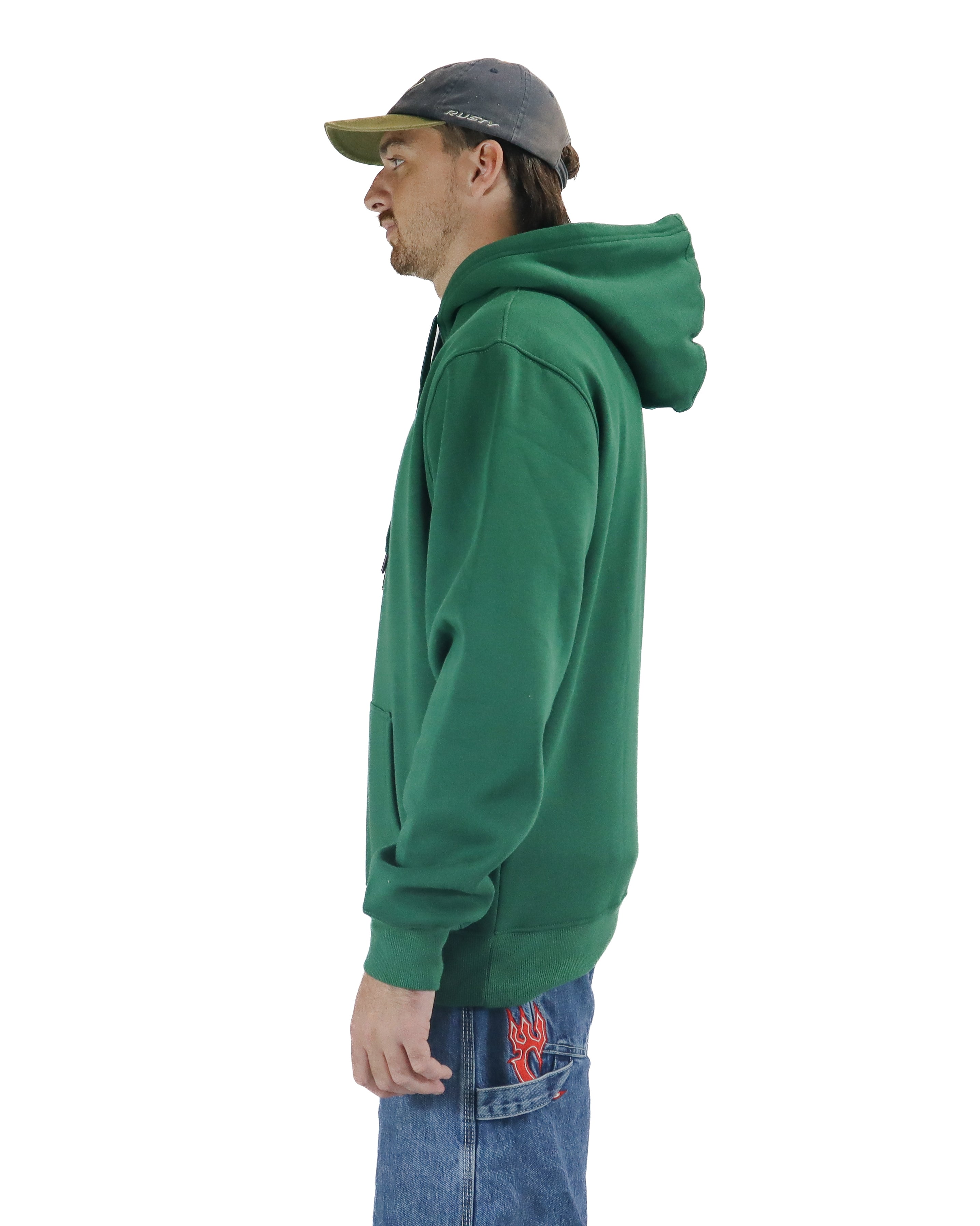 Side profile of green hoodie styled with blue jeans and cap
