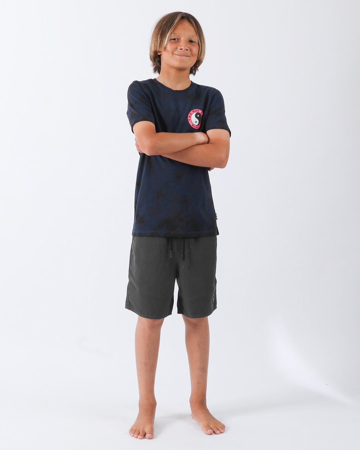 Full length navy T&C Surf Designs Hawaii yin yang tee with black shorts