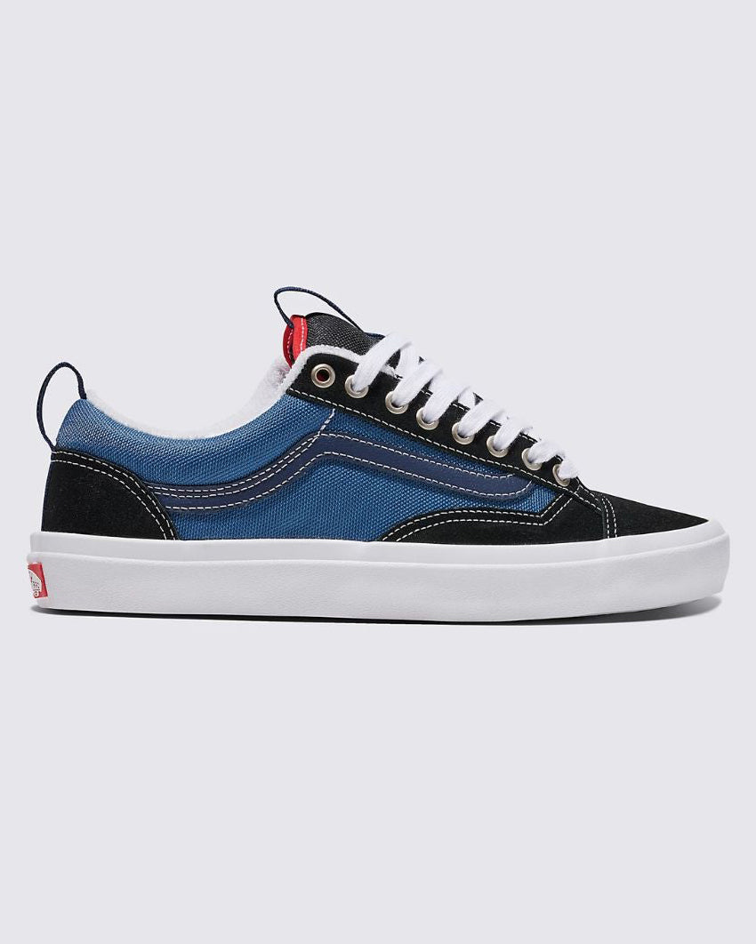 Blue and black low-top sneaker with white laces, contrast stitching, and white rubber sole, featuring a red heel tab.