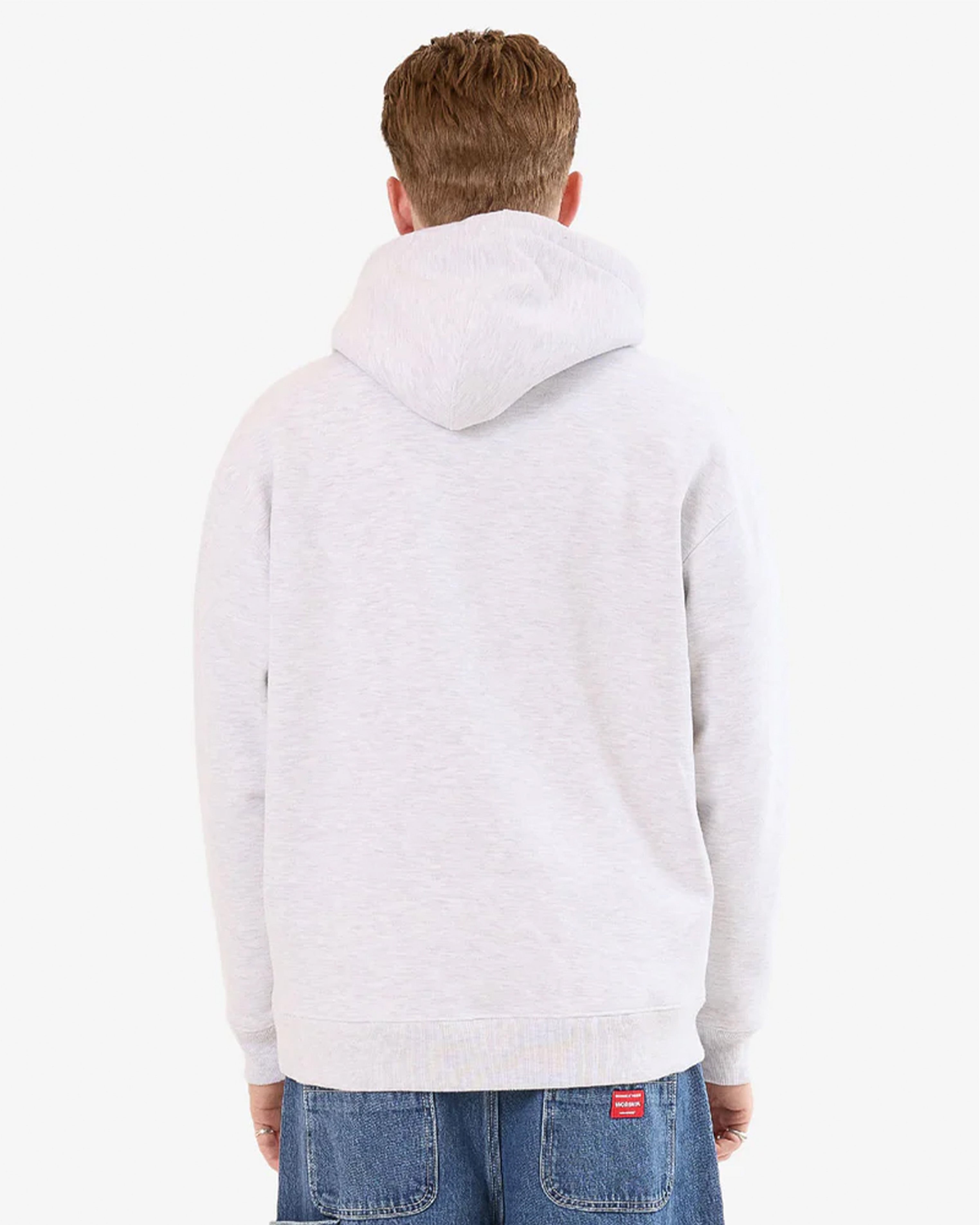 Back view of light grey Worship Supplies hoodie with hood up, styled with relaxed fit blue jeans