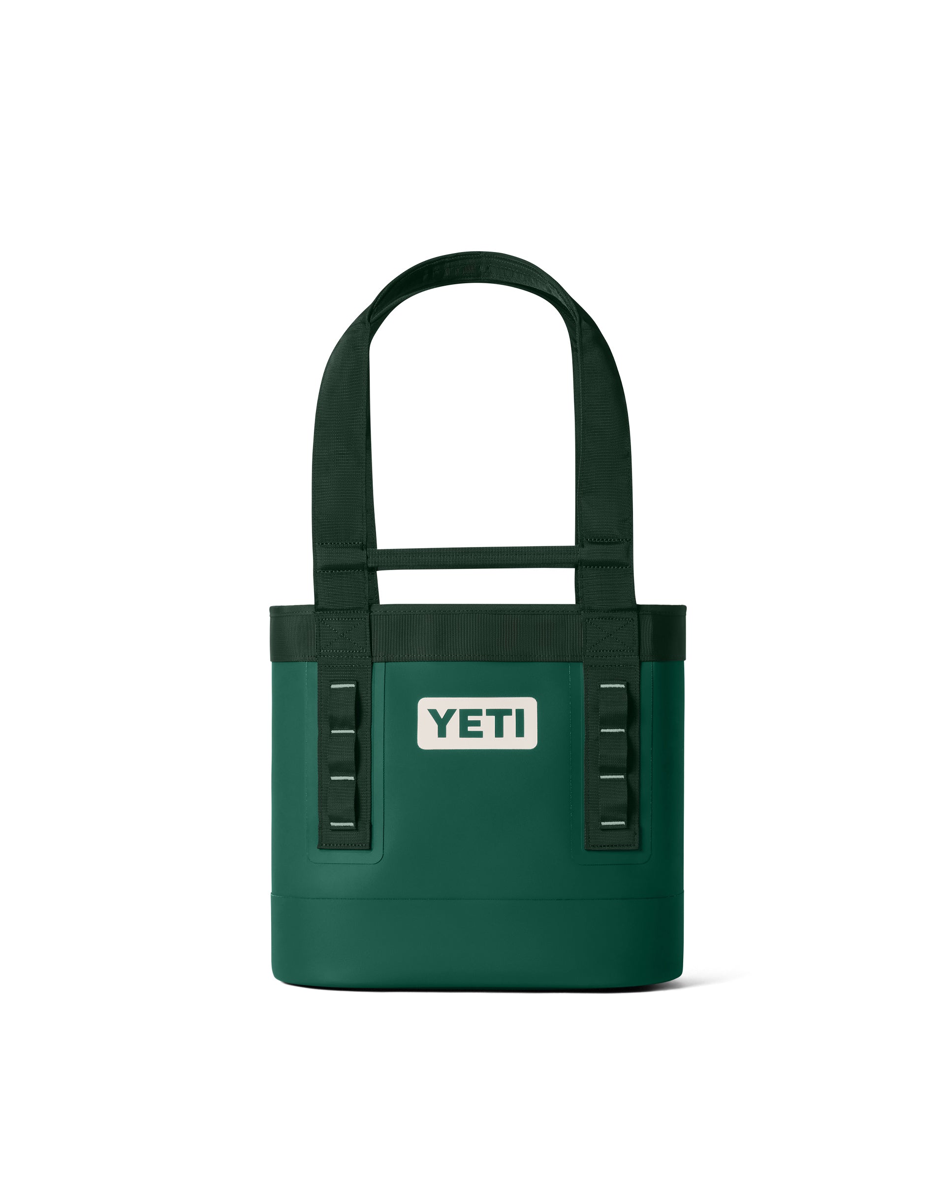Green YETI tote-style cooler bag with dual carry handles and front logo patch for easy transport