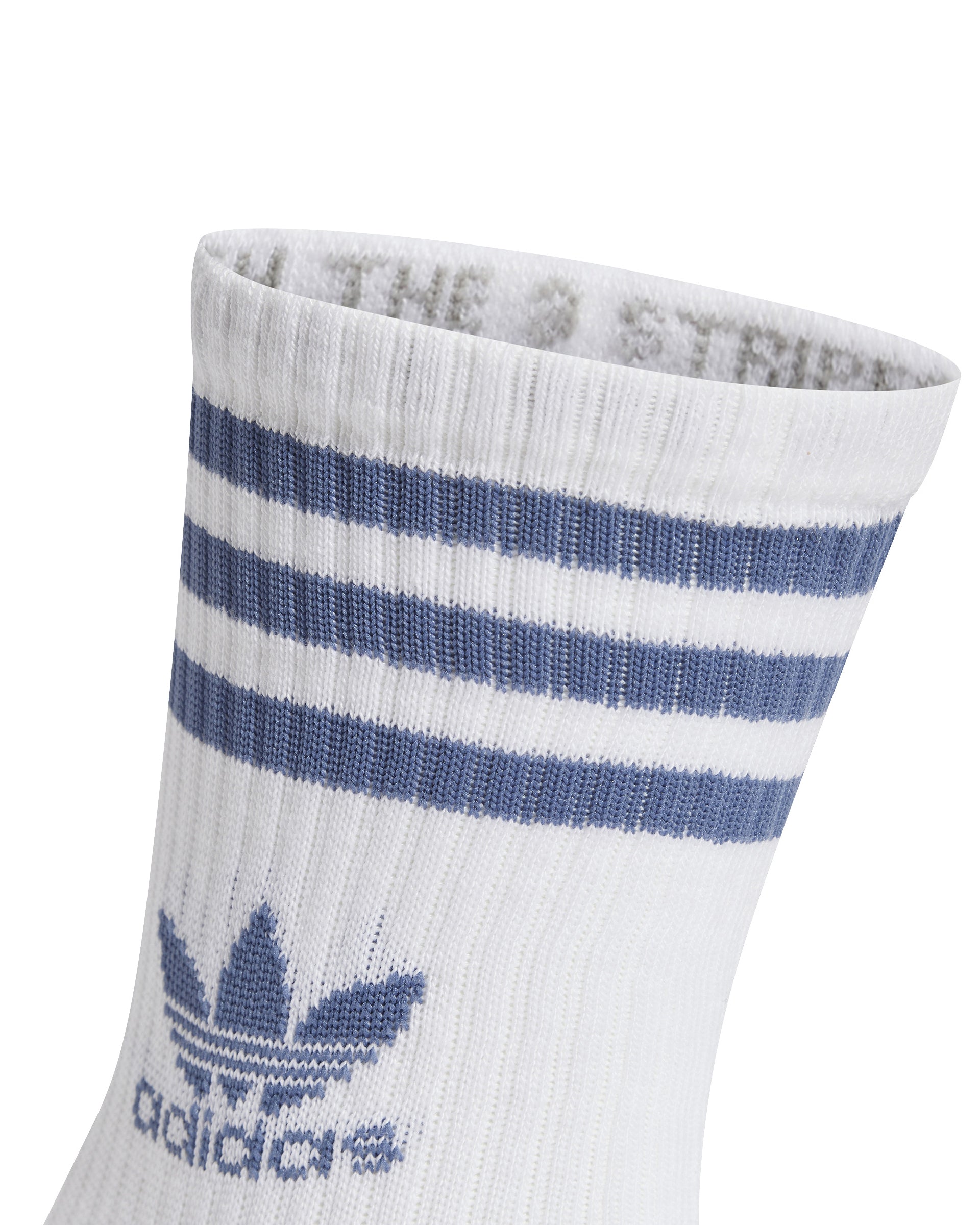 Close-up of a white Adidas crew sock featuring blue three-stripe detailing and a Trefoil logo near the ankle.