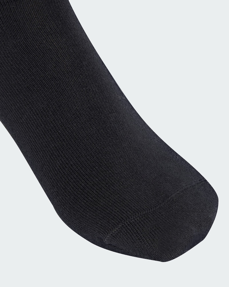 Close-up of adidas crew sock toe area showing soft ribbed fabric and seamless construction.