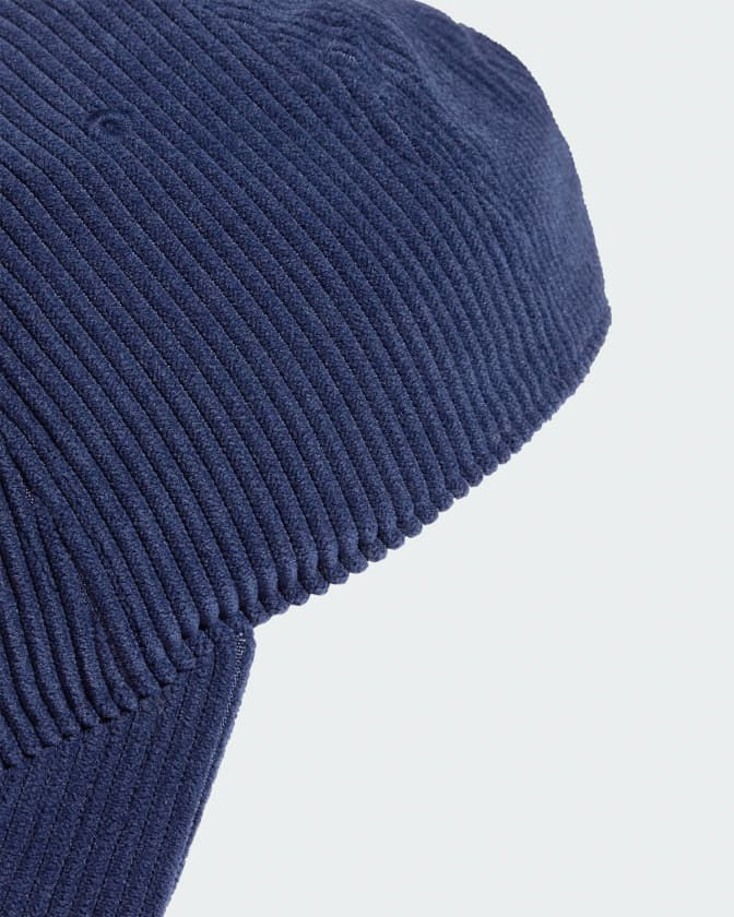 Close-up of navy corduroy texture on Adidas cap for a soft, vintage look