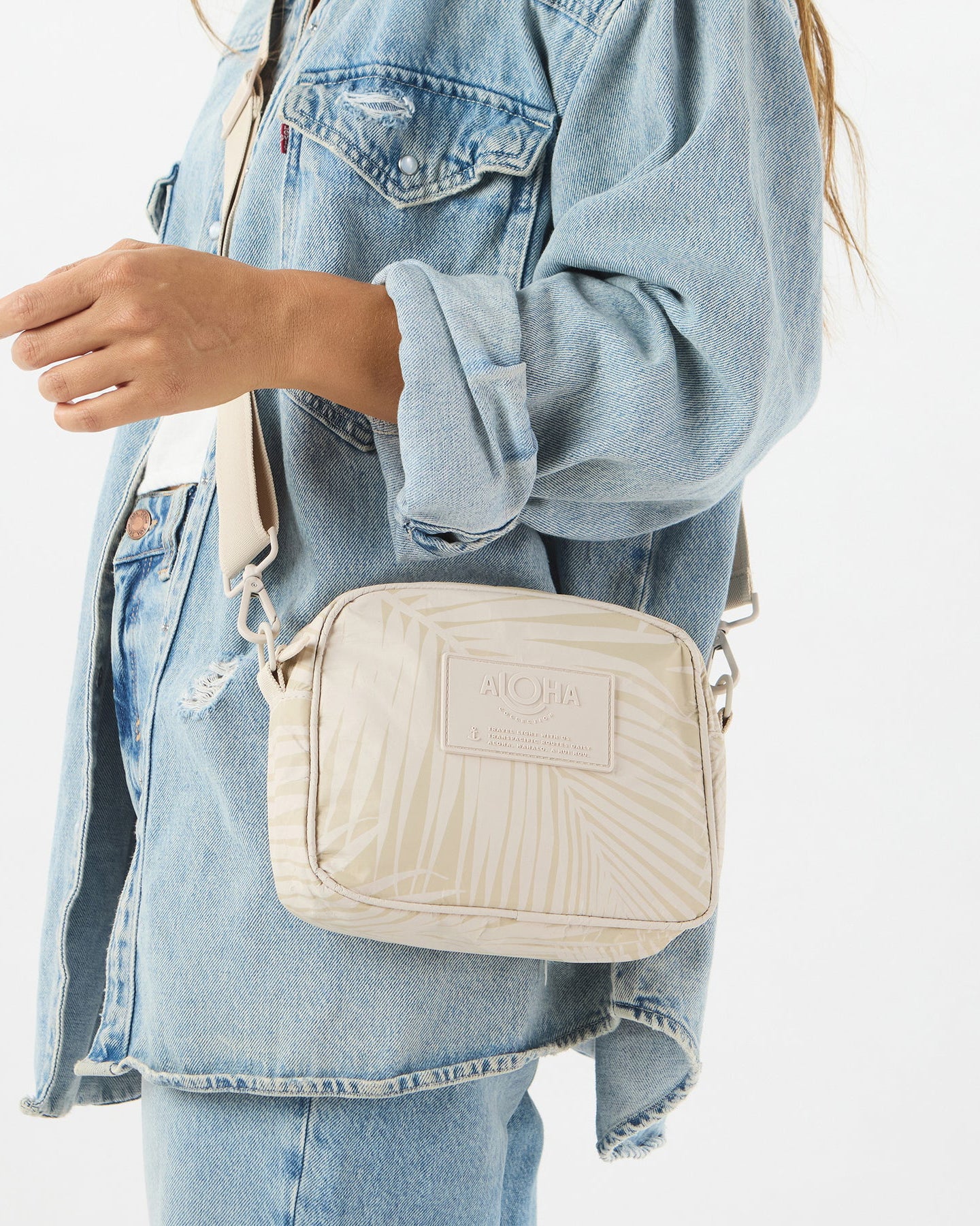 Areca Le Tour Crossbody Bag