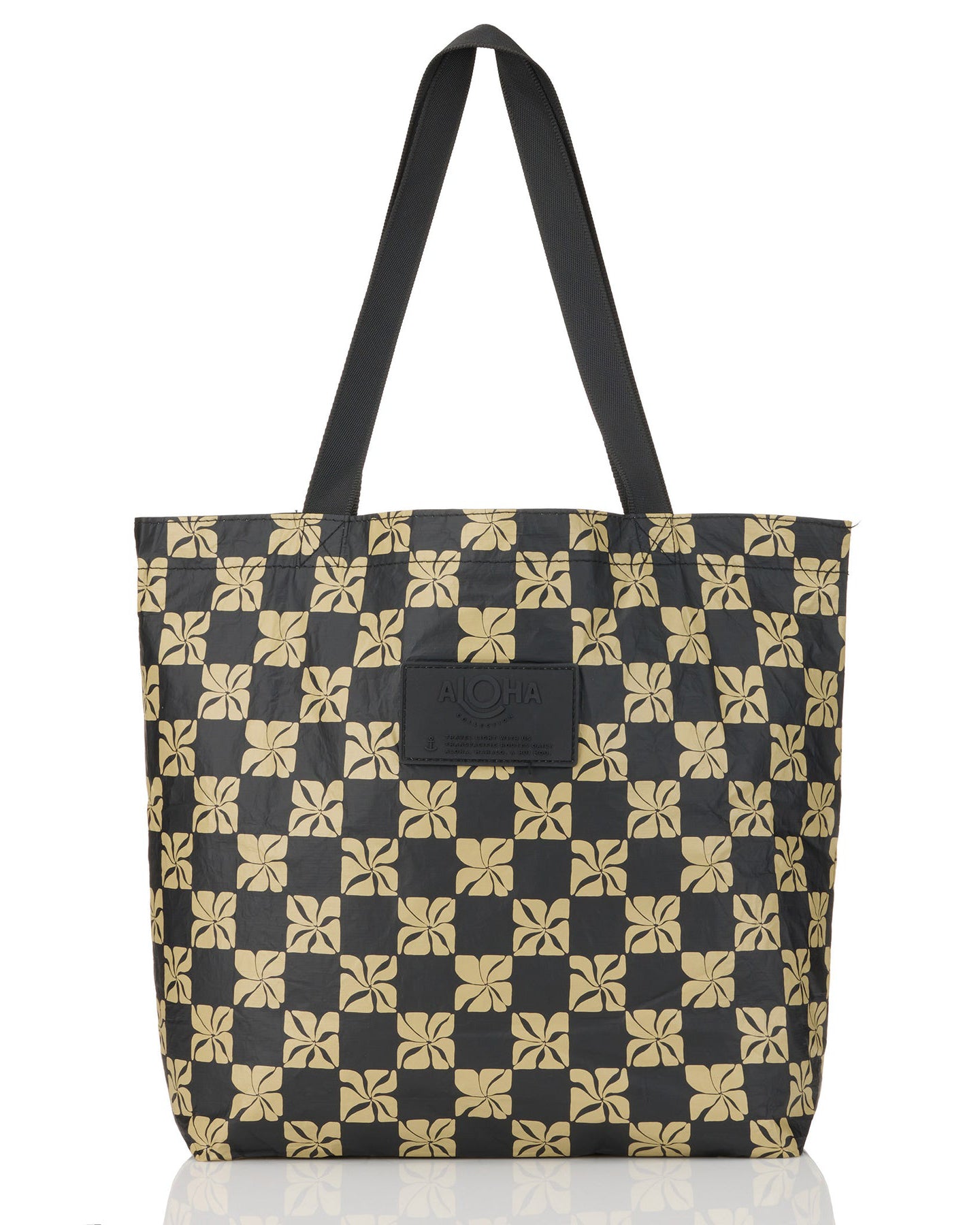 Black tote bag with beige floral checkerboard print and black handles by ALOHA Collection
