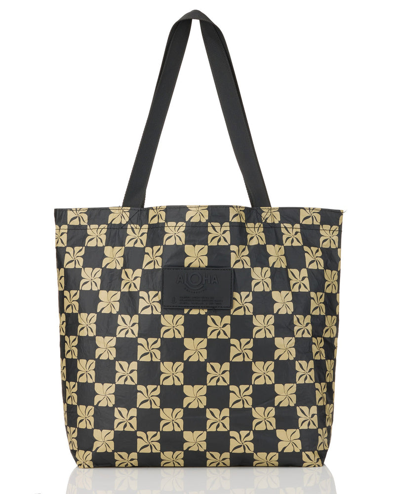 Black tote bag with beige floral checkerboard print and black handles by ALOHA Collection