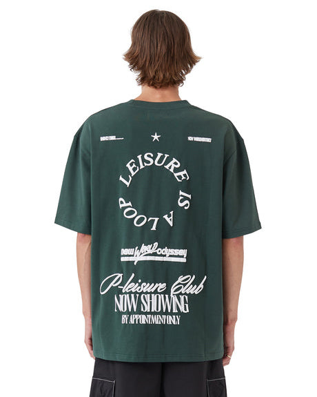 Dark green graphic t-shirt with large white back print, back view on model.