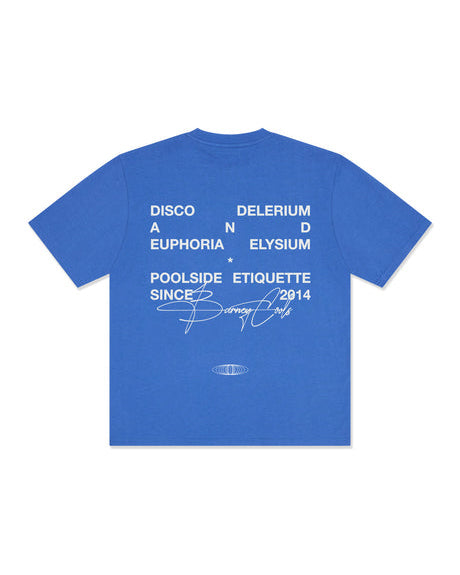 Back view of blue tee with bold white graphic text and signature-style branding.