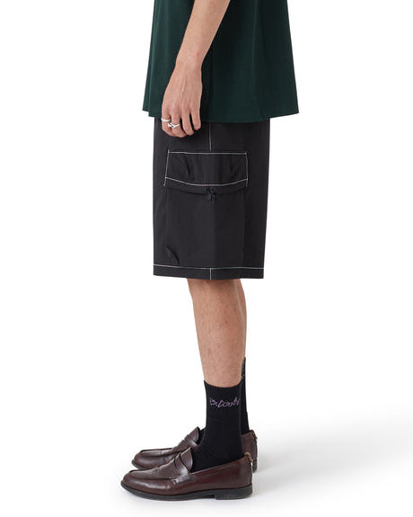 Side view of black cargo shorts with large pocket and contrast stitching.