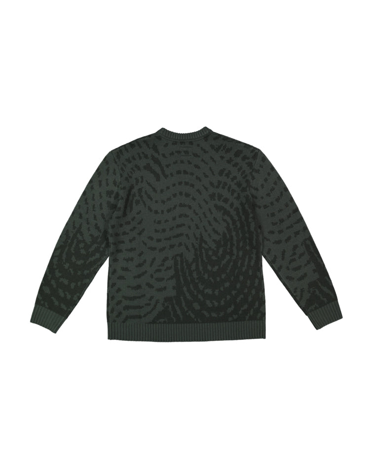 Back view of dark green crew neck jumper with fingerprint-style knit pattern.