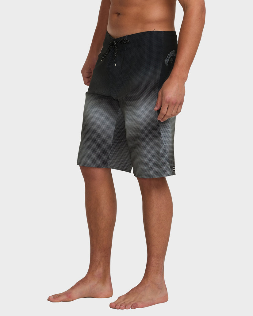 Side view of black gradient boardshorts with a drawcord waist and side logo detail.