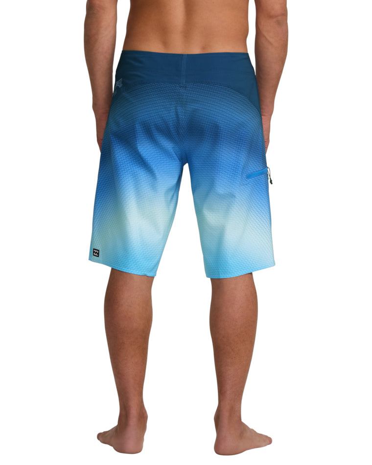 Rear view of ombre boardshorts with gradient blue colour and back zip pocke