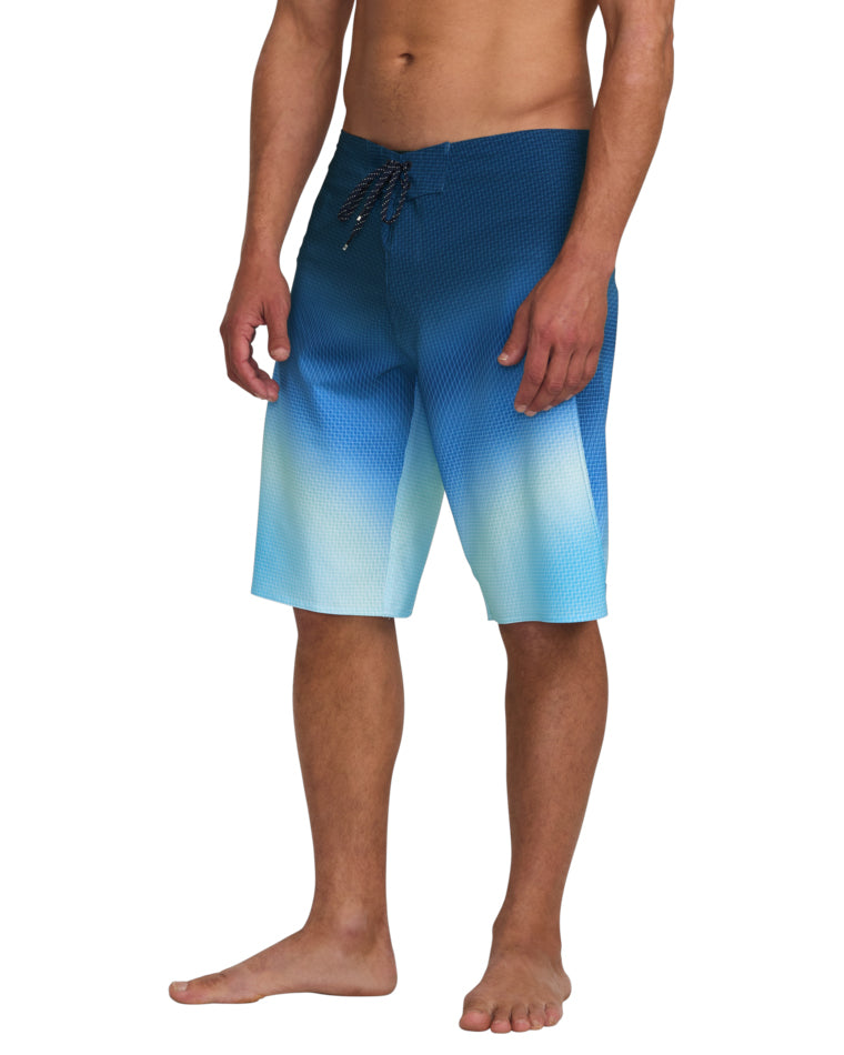 Side angle of ombre blue boardshorts with drawcord waistband and relaxed fit