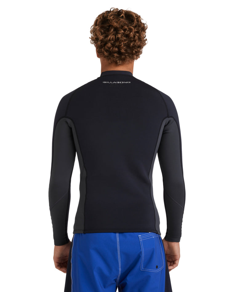 Back view of black wetsuit top with small white Billabong logo on neck.