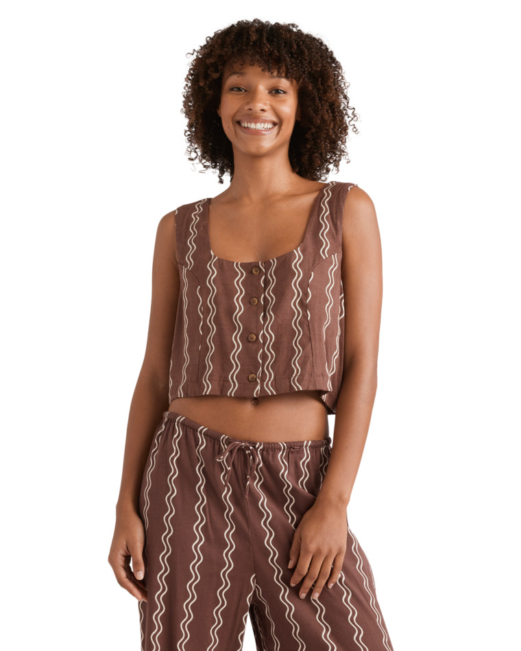 Sleeveless brown crop top with front buttons and cream zig-zag stripe print.