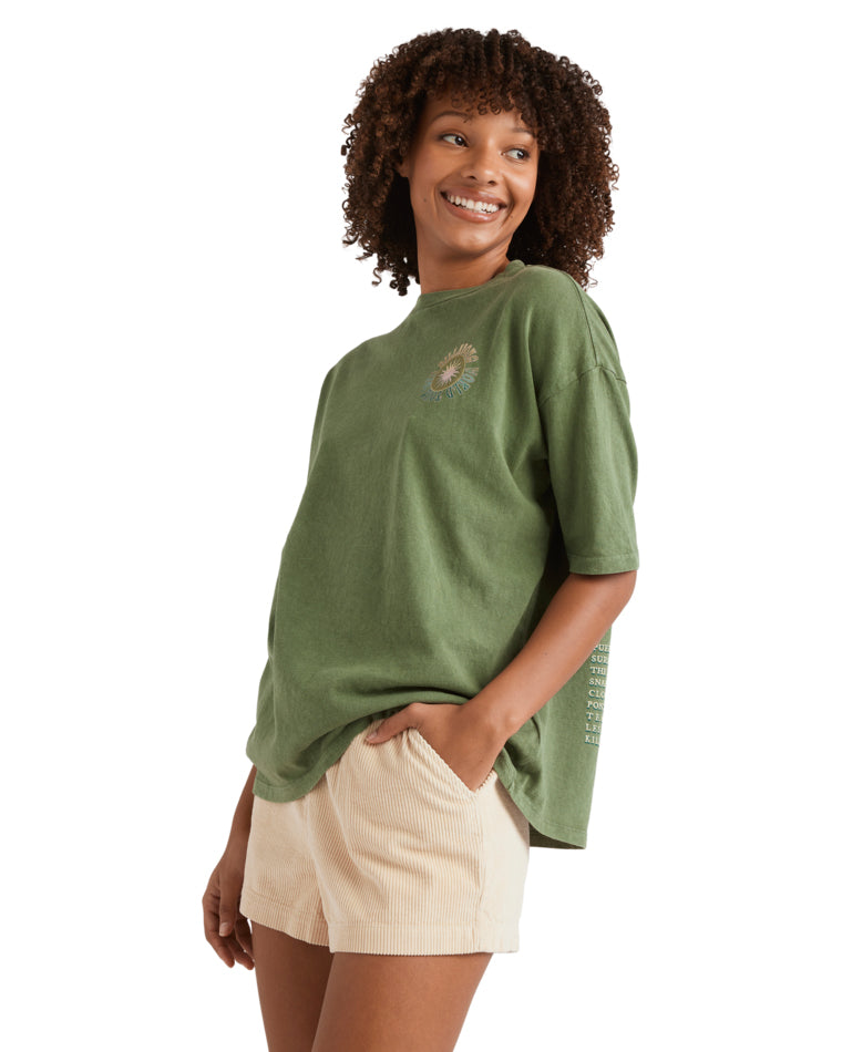 Side view of green Billabong tee with front chest graphic and relaxed fit.