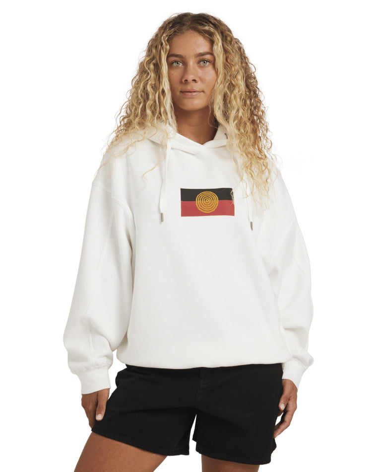 Front view of white hoodie with printed Aboriginal flag on chest.