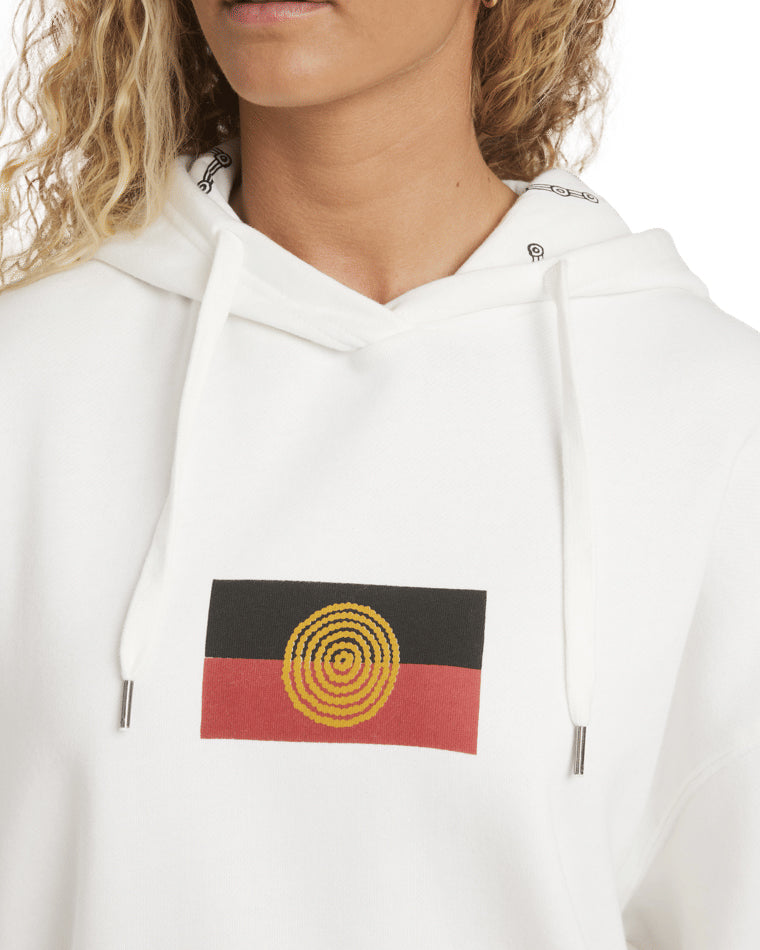 Close-up of Aboriginal flag graphic on front of white hoodie.