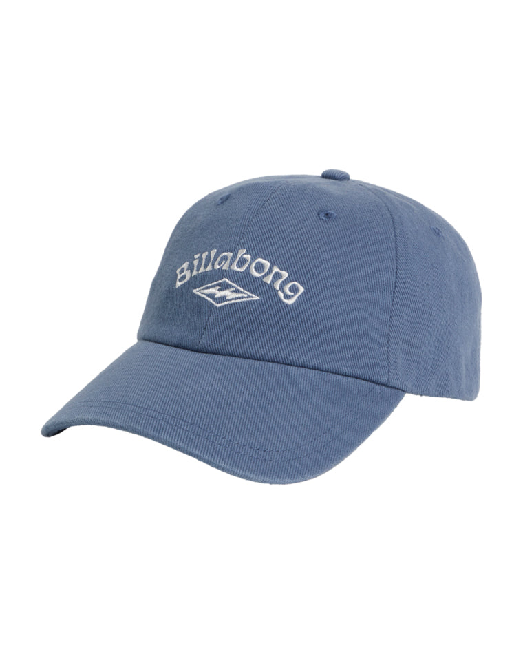 Angled side view of the blue Billabong cap displaying curved brim.