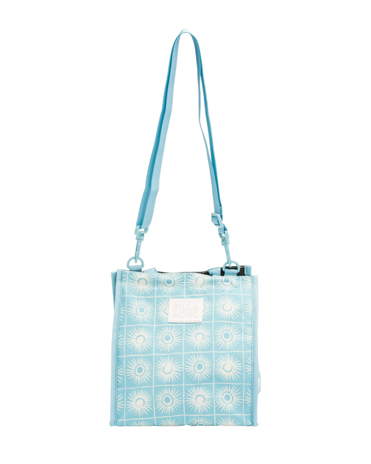 Light blue Billabong shoulder bag with white sunburst pattern and adjustable long strap.