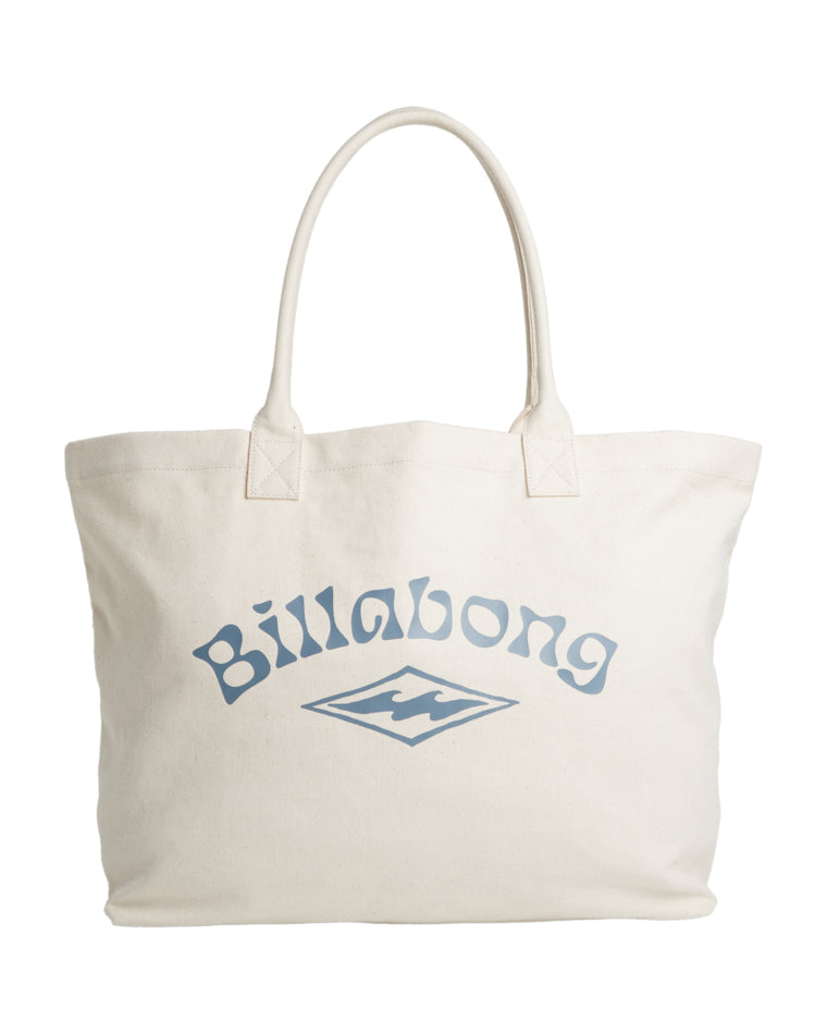 Cream canvas tote bag with light blue "Billabong" text and wave logo on the front.