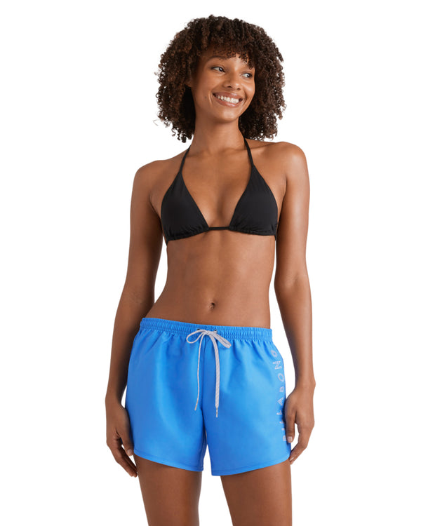 Black triangle bikini top paired with bright blue boardshorts featuring a drawcord waist
