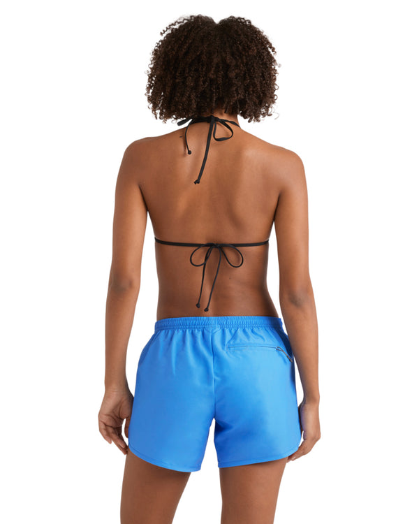Back view of black halter bikini top and blue boardshorts with elastic waistband and tie back