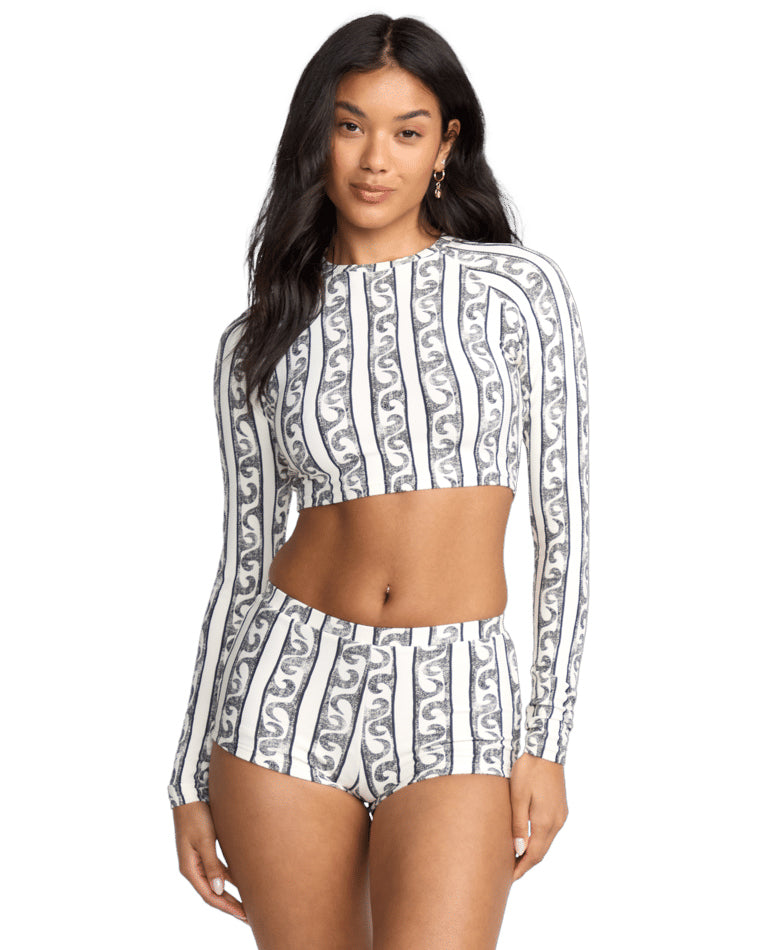 Black and white striped long sleeve crop rash vest with matching high-waisted bottoms, front view.