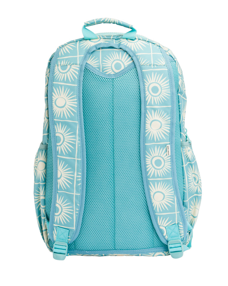 Back view of a blue backpack with white sunburst pattern, padded mesh panel and adjustable straps.
