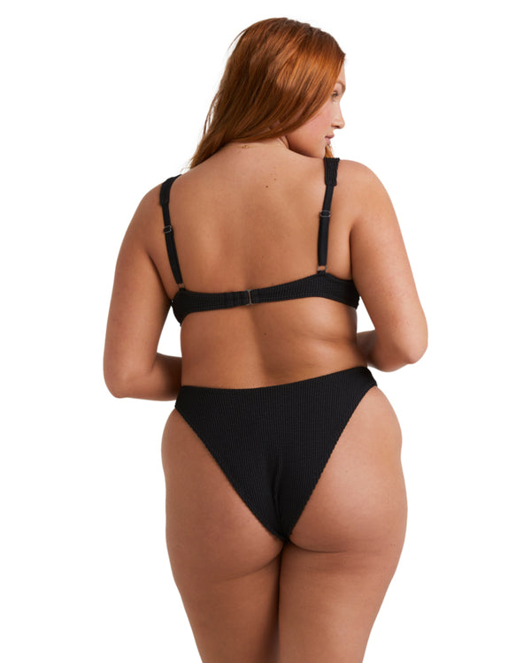 Back view of black bikini with adjustable straps and cheeky cut bottoms.