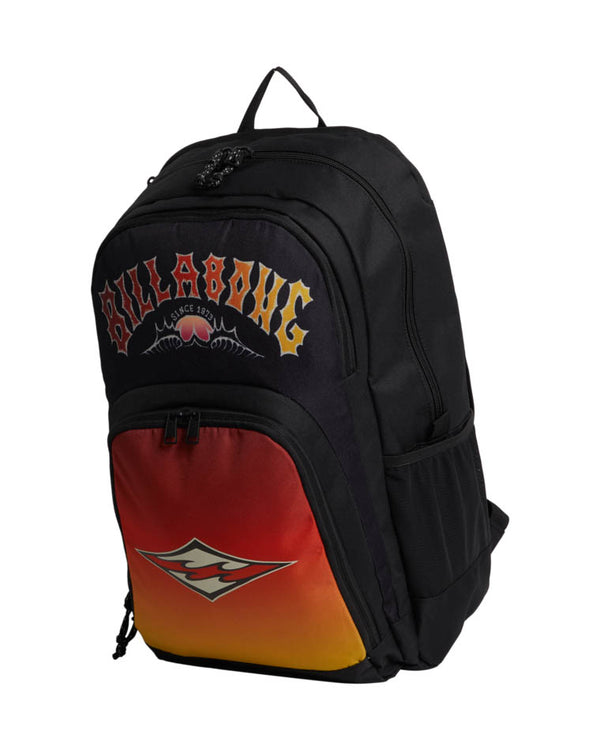 Black Billabong backpack with a vibrant red-to-yellow gradient front pocket, bold logo graphic, and multiple compartments.