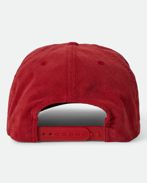 Back view of a red corduroy baseball cap featuring an adjustable snapback closure for a customizable fit.