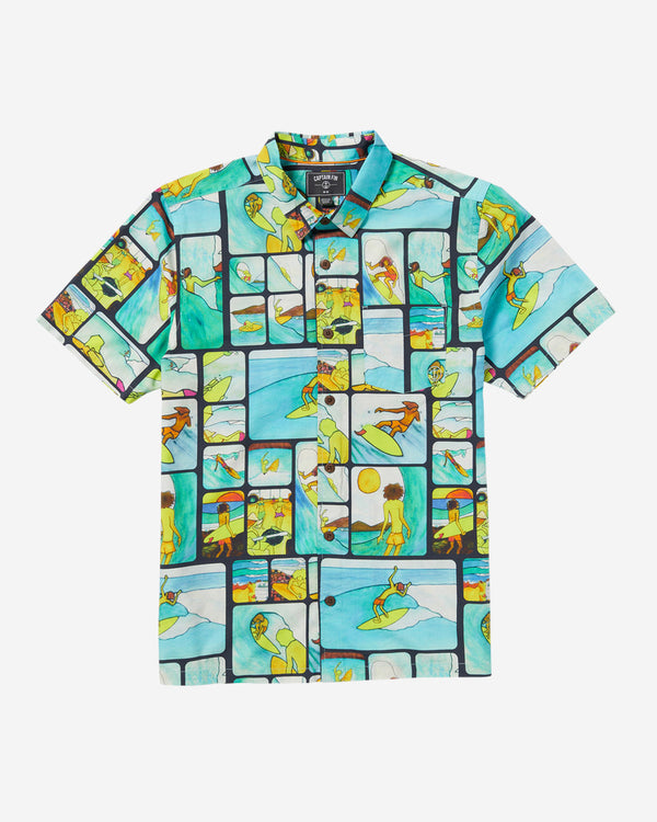 Short-sleeve button-up shirt with a vibrant comic-style surfing print, featuring ocean waves, surfers, and beach scenes.