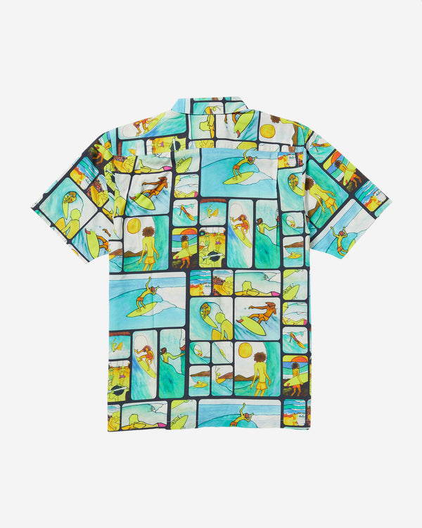 Back view of a short-sleeve button-up shirt with a vibrant comic-style surfing print, featuring waves, surfers, and beach scenes.