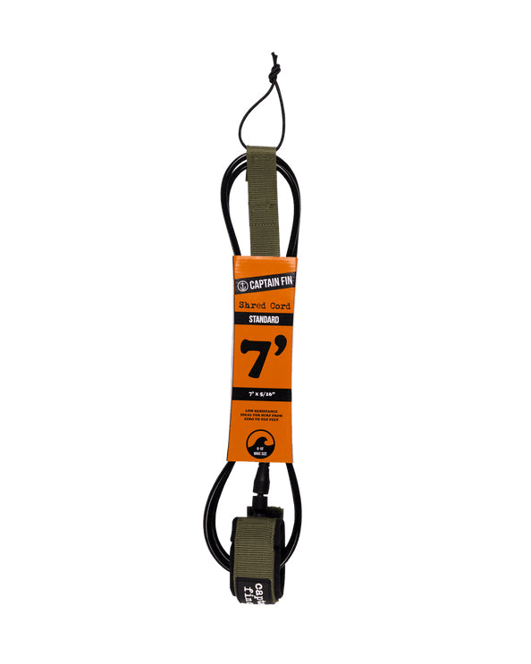 Captain Fin Shred Cord 7ft surfboard leash in olive green with orange packaging