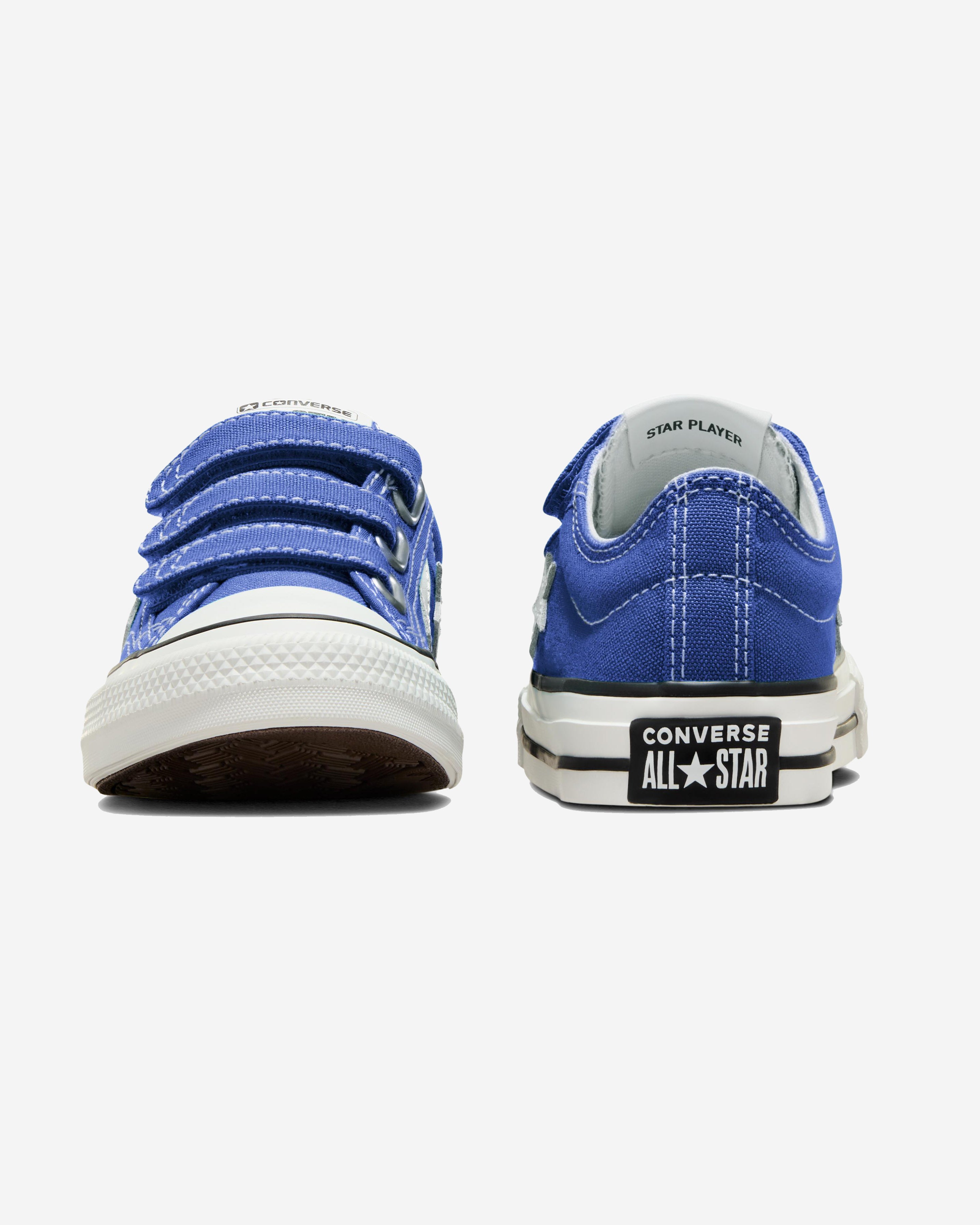 Front and back view of blue Converse Star Player sneakers with velcro straps, white rubber toe caps, and All-Star logo.
