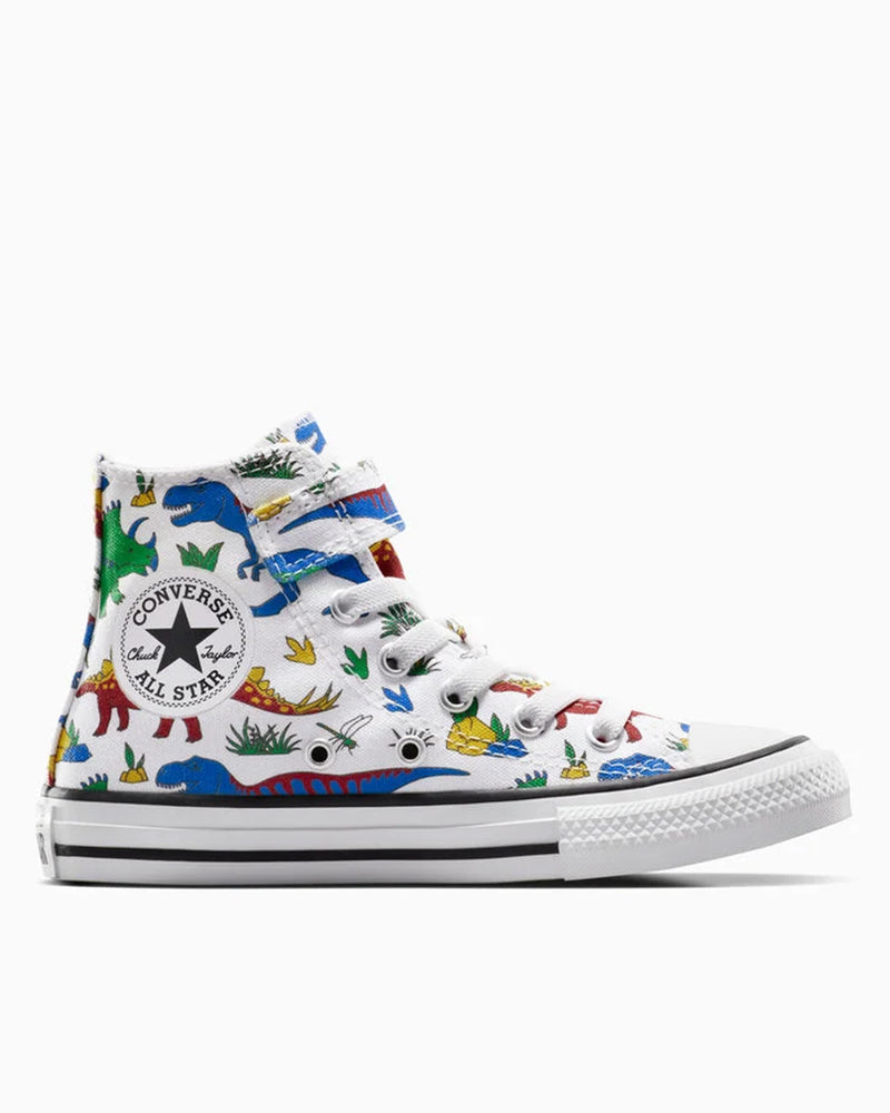 Kids’ Converse high-top sneakers with colourful dinosaur print and white laces, side view with All Star patch.