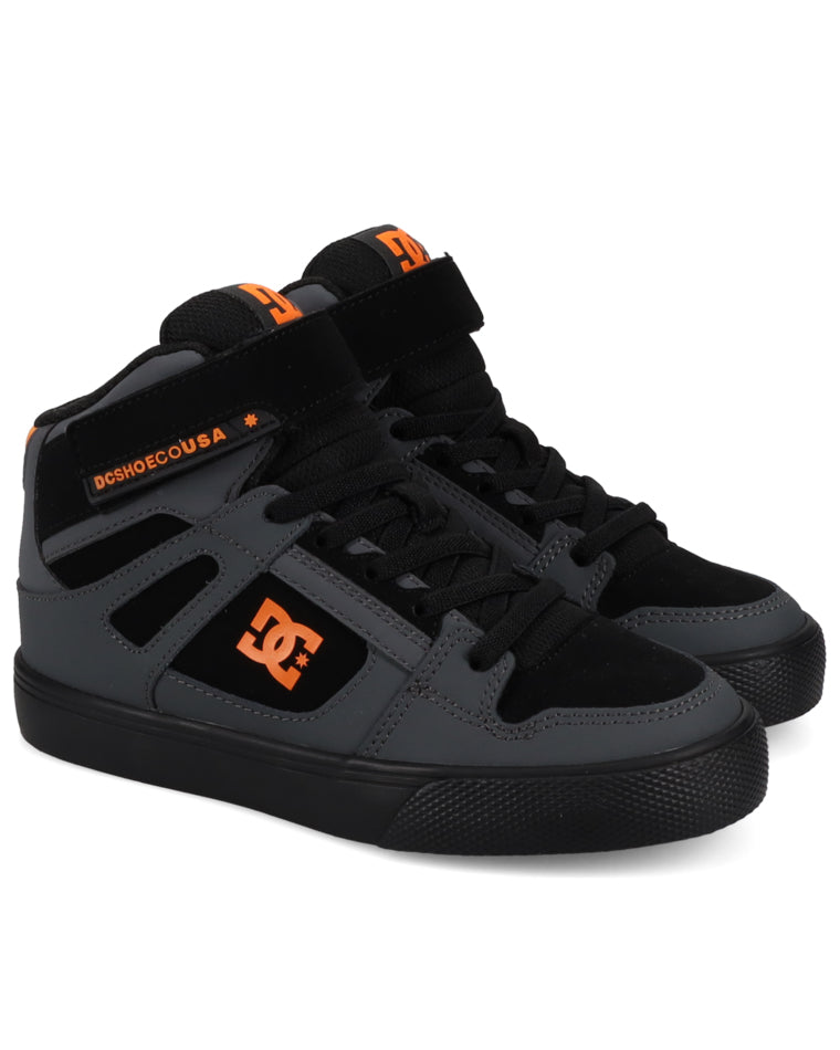 Black and orange DC mid-top skate shoes with Velcro strap and logo on the side